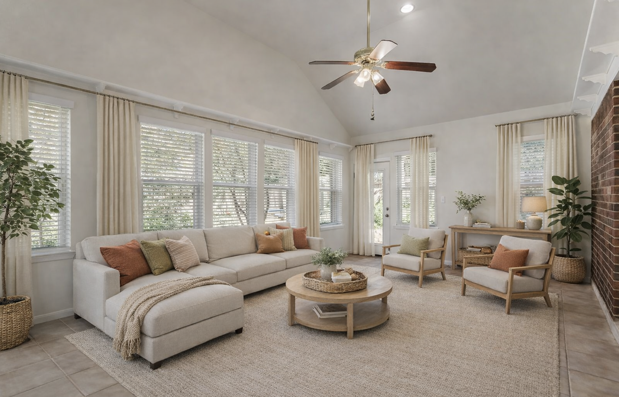 Large living area after — warm family gathering space with conversation zones and scale-appropriate furnishings