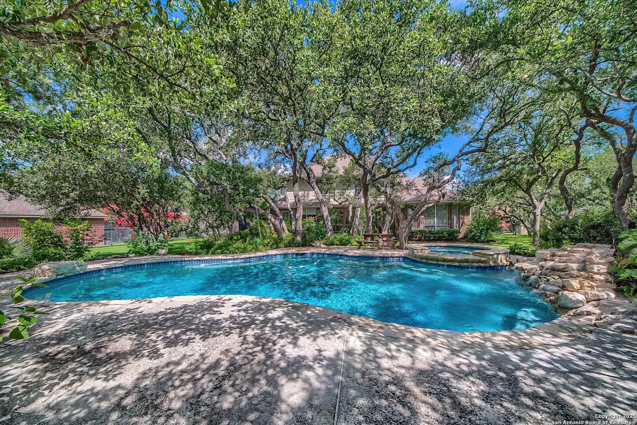 Backyard before — underutilized outdoor space with no defined atmosphere or gathering areas